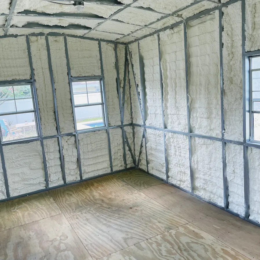 Closed-cell spray foam insulation applied to wall cavities in a residential project in Progress Village